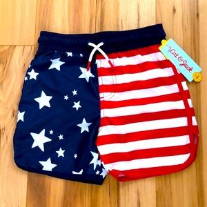 New Boy’s swim trunks.  Size XS 4/5.  Flag design, red, white and blue.